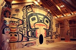 Modeled after a Tlinget Clanhouse the motif is carried throughout the space, mostly wood, and iconography from Southeastern Alaska.