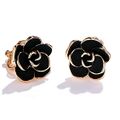 The black rose with gold trim earrings Haukea wore to her second crew awards ceremony selected to pair with a black floral dress.
