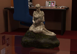 A small statue of the ancient Trill goddess of knowledge and wisdom sits on the coffee table.